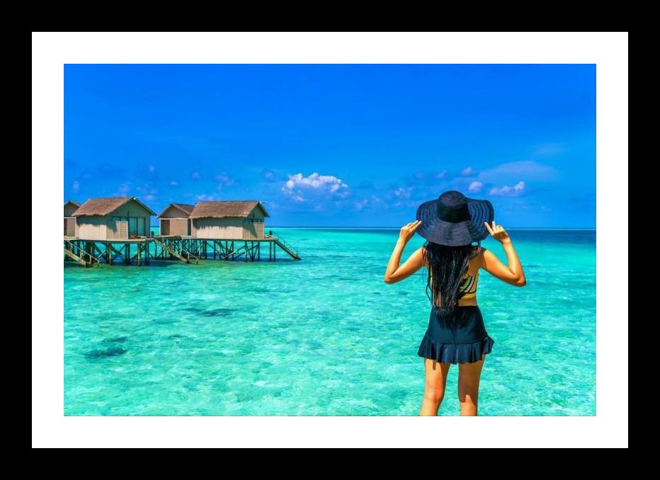 Paradise View: Woman, Turquoise Waters, Bungalows - A Stunning Photo. Wall Art, Interior Accents, Framing Solutions, Residential/Commercial Decor, Premium Gifts | Size: 8 x 12 inches